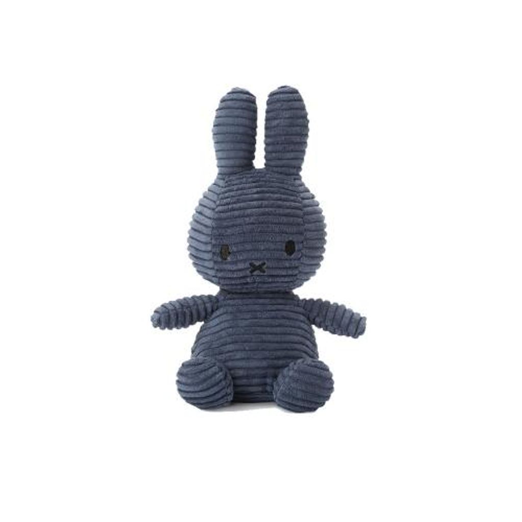 A stuffed toy rabbit sitting on a white background.