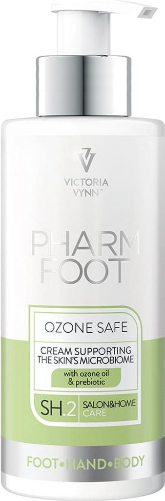 A product shot of a pump bottle of cream.