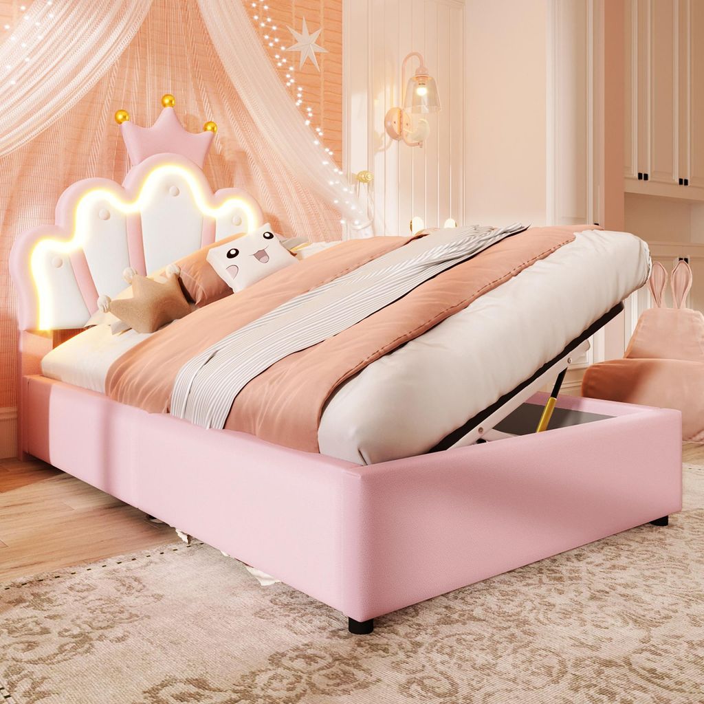 A child's bedroom with a pink bed and crown-shaped headboard.