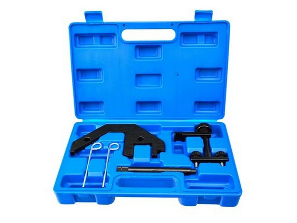 A blue plastic toolbox containing various black metal automotive tools.