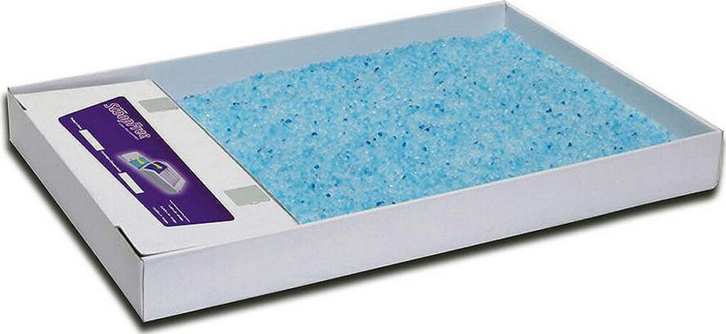 A white tray filled with blue crystal cat litter, with a purple and white label on the side.