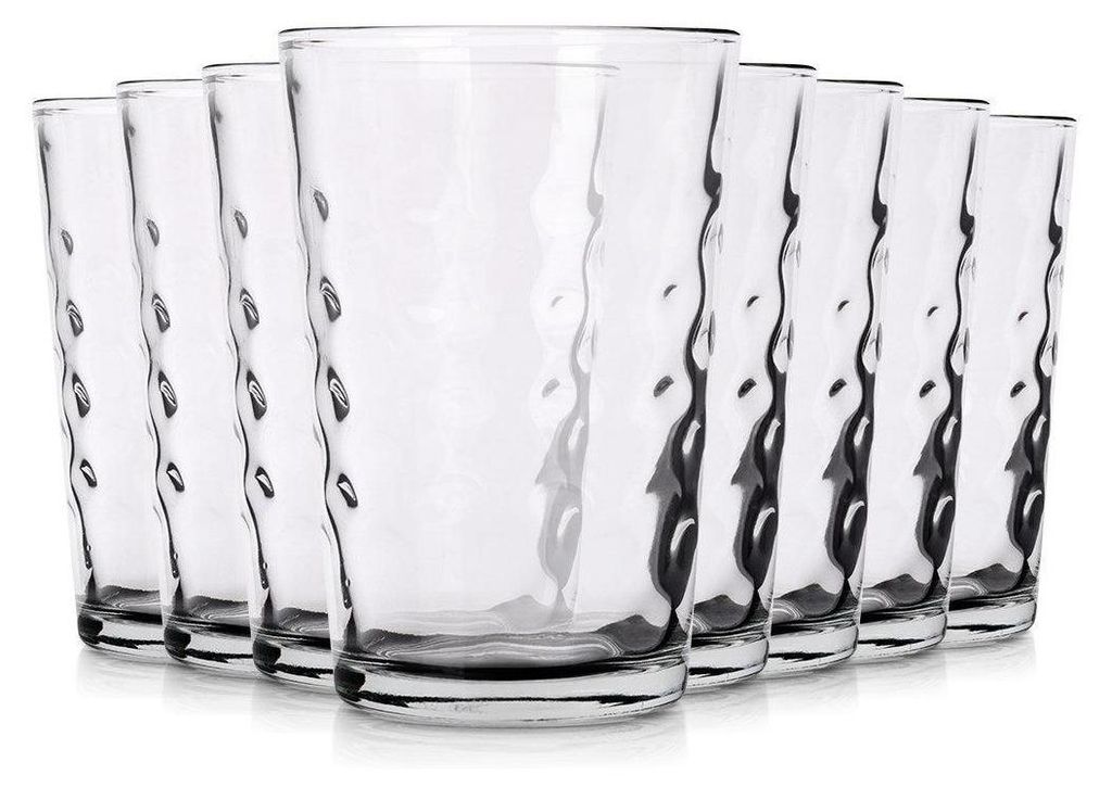 A set of clear glasses with a textured surface.