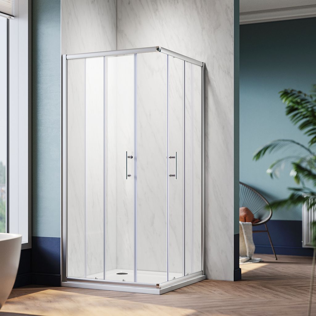 A modern bathroom with a corner shower cabin.