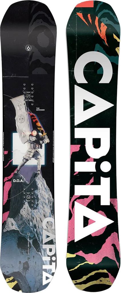 Two snowboards are shown side-by-side against a black background. The snowboard on the left has a dark, abstract graphic with text and an image of a person. The snowboard on the right has the brand name 'CAPITA' in large white letters against a colorful, a