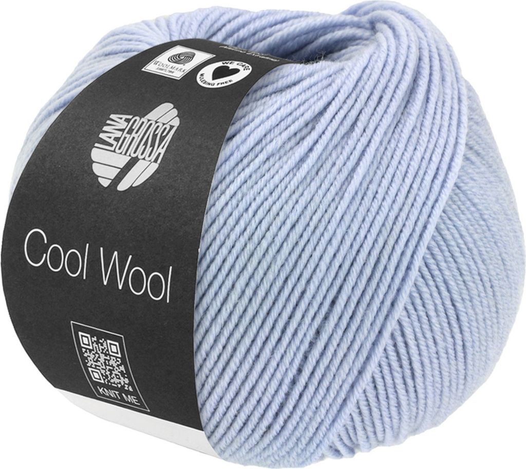 A ball of light blue yarn with a black label.