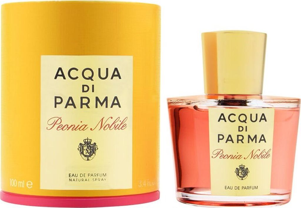 A perfume bottle and its cylindrical packaging are displayed side-by-side against a white background.