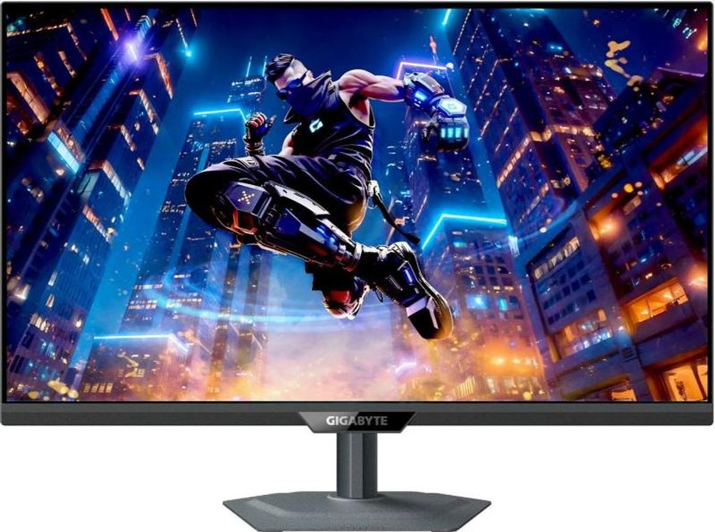 A gaming monitor displaying a dynamic image of a futuristic warrior leaping through a neon-lit cityscape.
