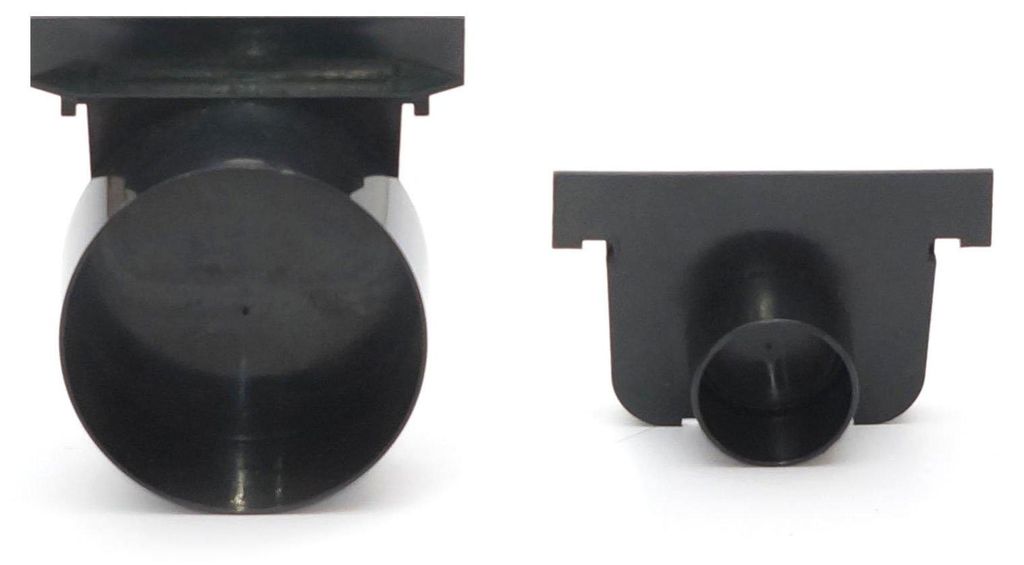 Two black plastic drain components are shown from different angles on a white background.