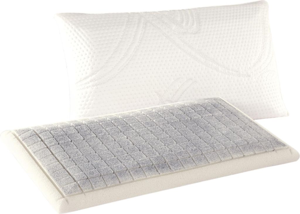 A pillow with a removable cover is shown, with the inner pillow exposed to reveal a textured surface.