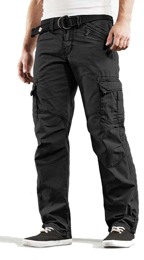 A person wearing black cargo pants and black sneakers, shown from the waist down.