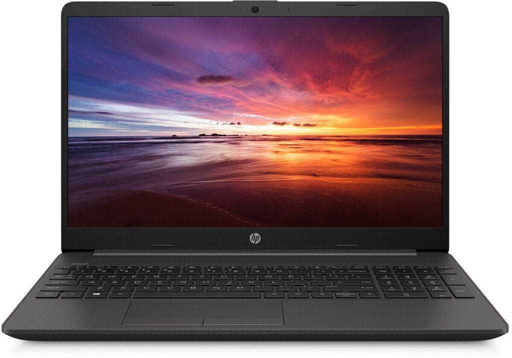 A black HP laptop is shown from the front, displaying a colorful sunset scene on its screen.