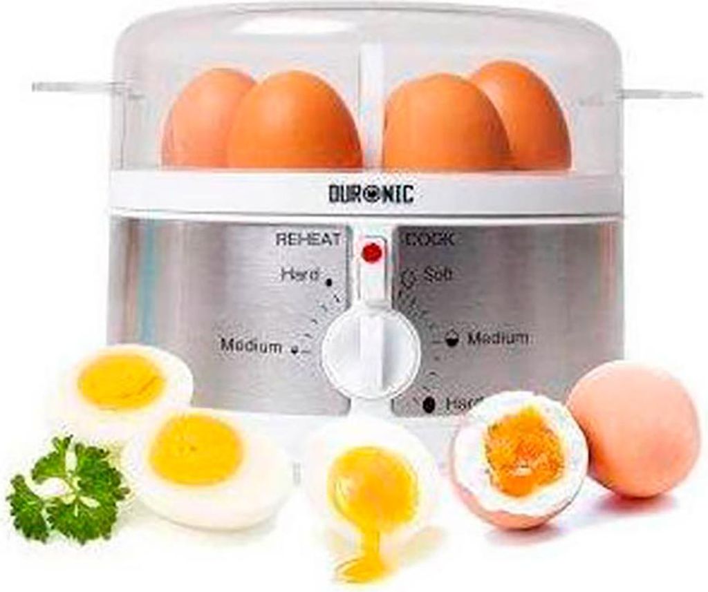 An egg cooker with eggs inside and boiled eggs displayed in front.