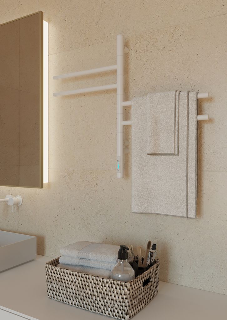 A modern bathroom scene with a white towel warmer, towels, and toiletries on a countertop.