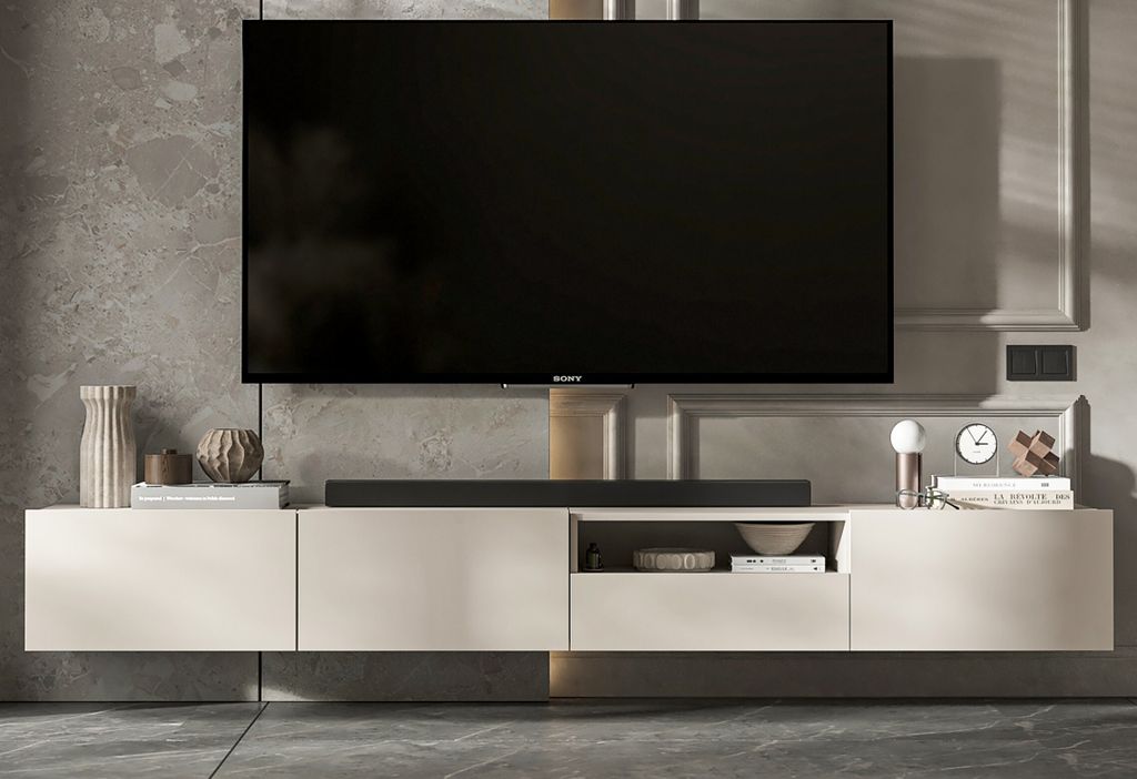 A modern TV cabinet with a television mounted above it, set against a textured wall.