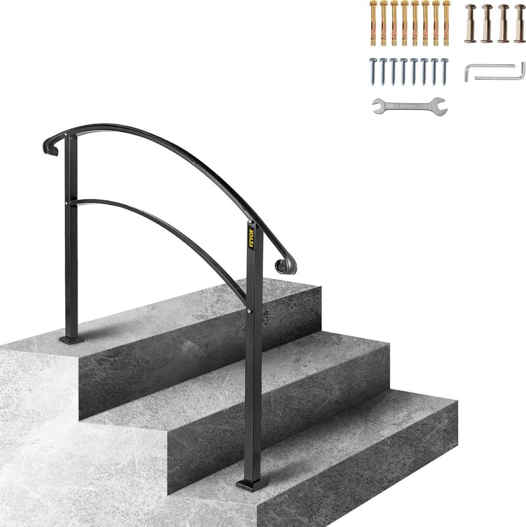 A black metal handrail installed on outdoor concrete steps.