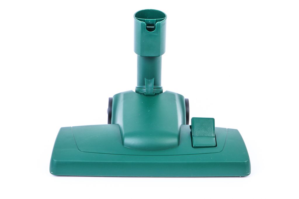 A green vacuum cleaner attachment, a floor nozzle, is shown against a white background.