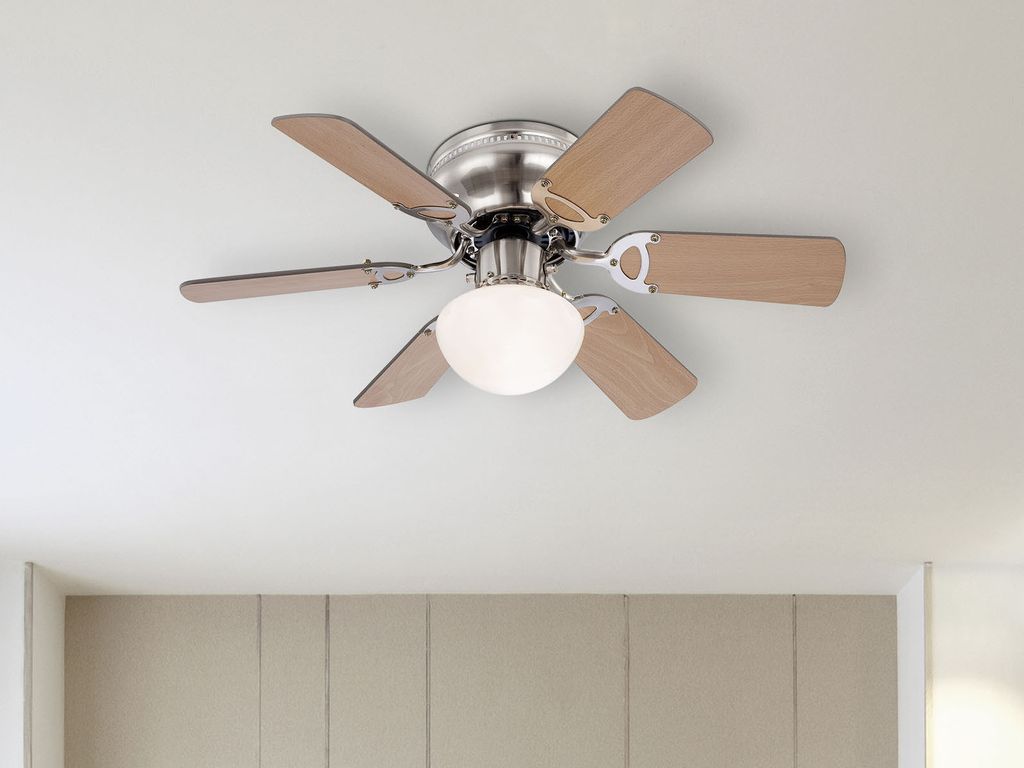 A ceiling fan with lights mounted on a white ceiling.