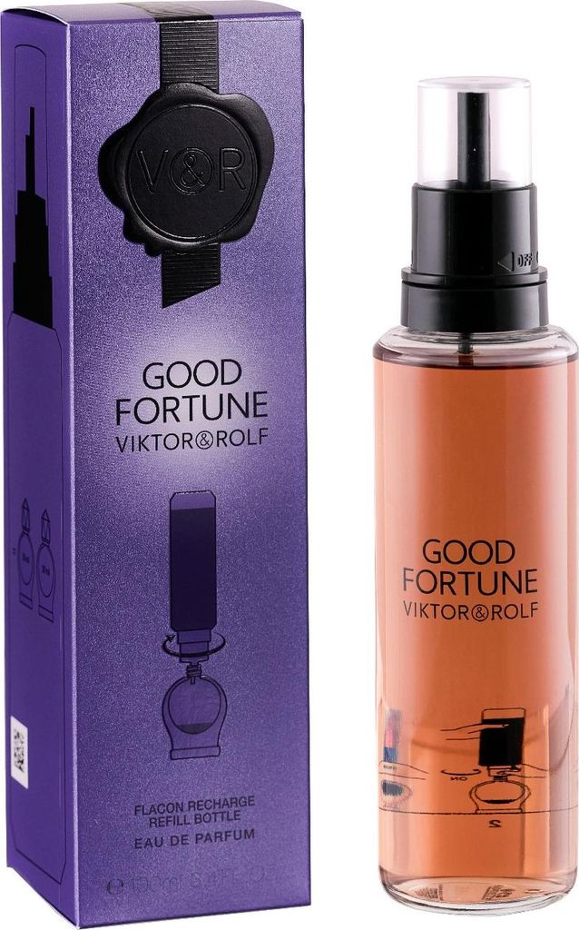 A perfume bottle and its packaging are displayed side-by-side against a white background.