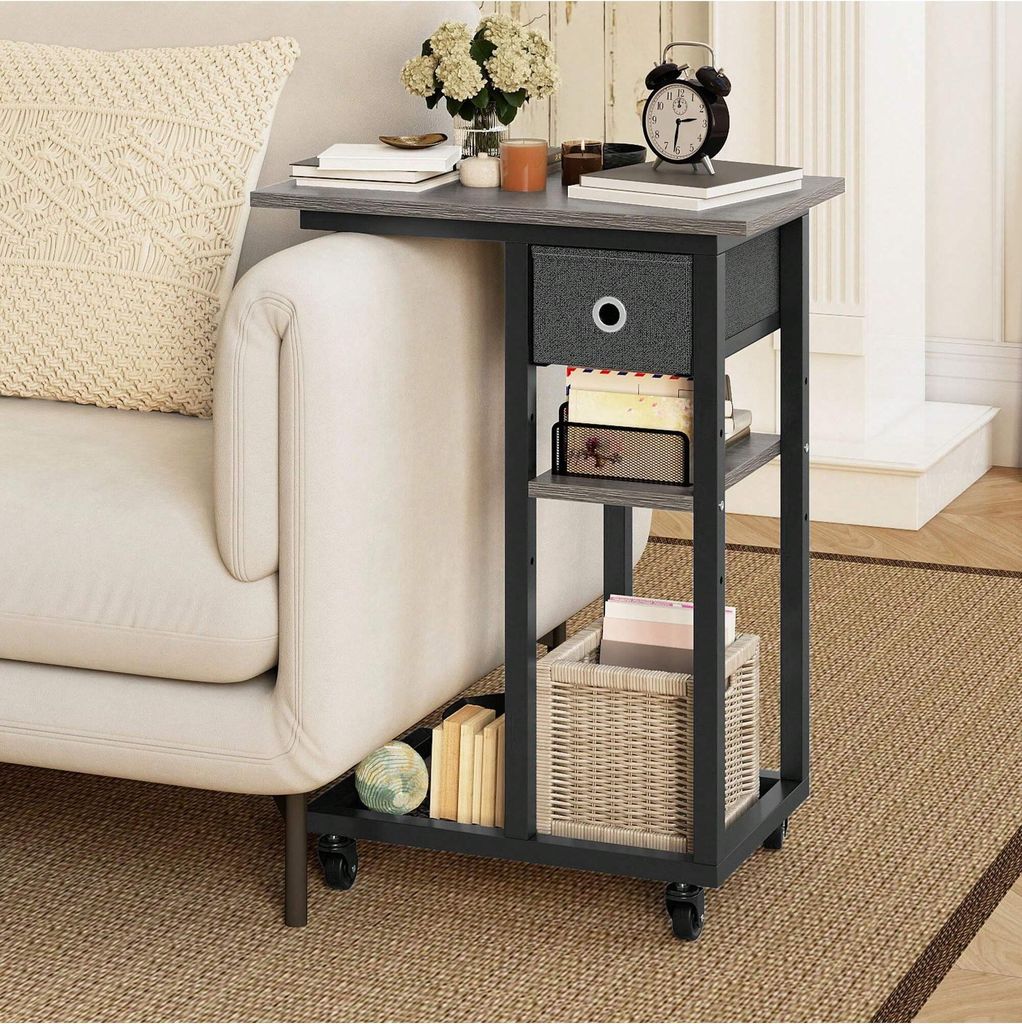 A side table with storage next to a sofa, in a living room setting.