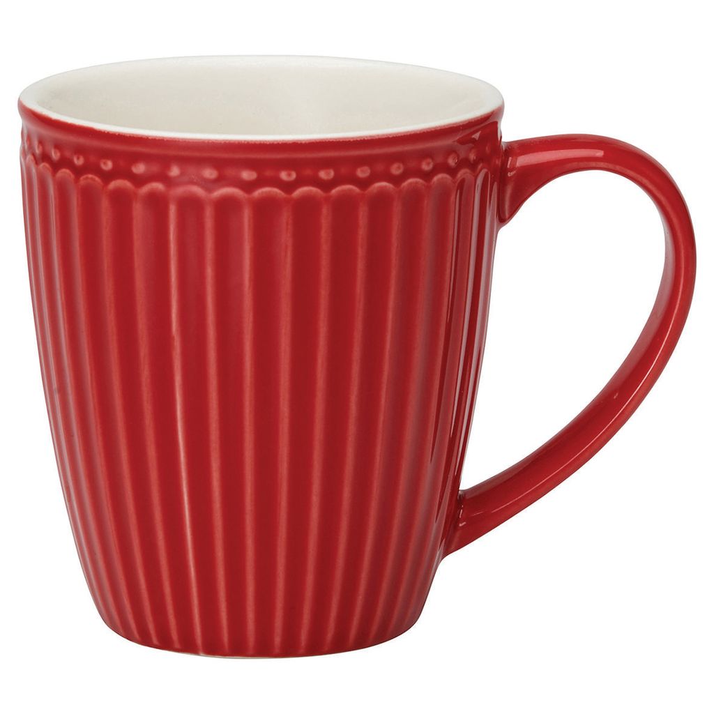 A red mug with a white interior is shown against a white background.