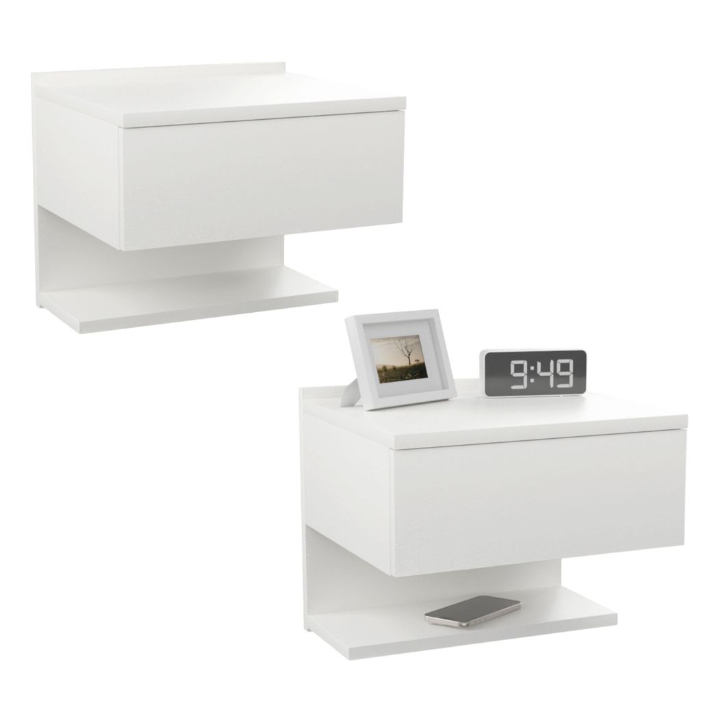 Two white wall-mounted nightstands are shown against a white background. One is positioned higher and to the left, while the other is lower and to the right. The lower nightstand has a framed picture and a digital clock on top, and a smartphone on the shel
