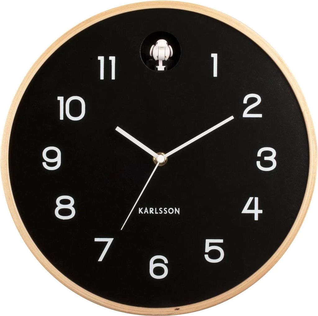 A Karlsson wall clock with a black face and white numbers, set against a plain white background.