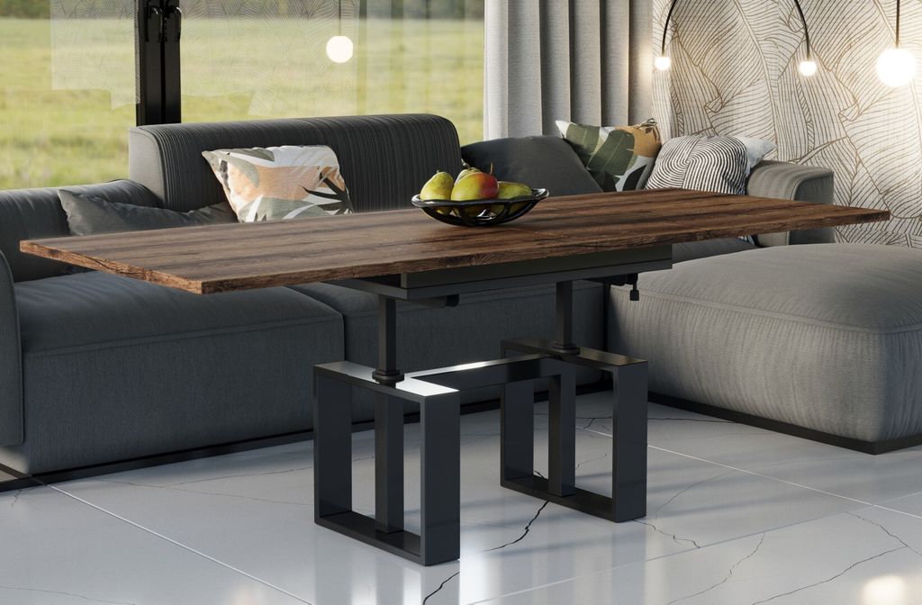 A modern living room with a sofa, coffee table, and ottoman.