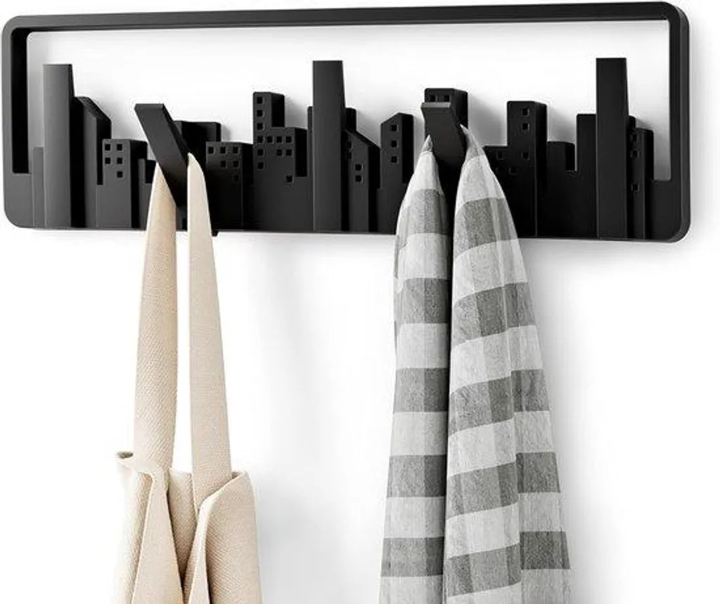 Porte-manteaux en métal noir gain de place idéal pour petite entrée de studio
