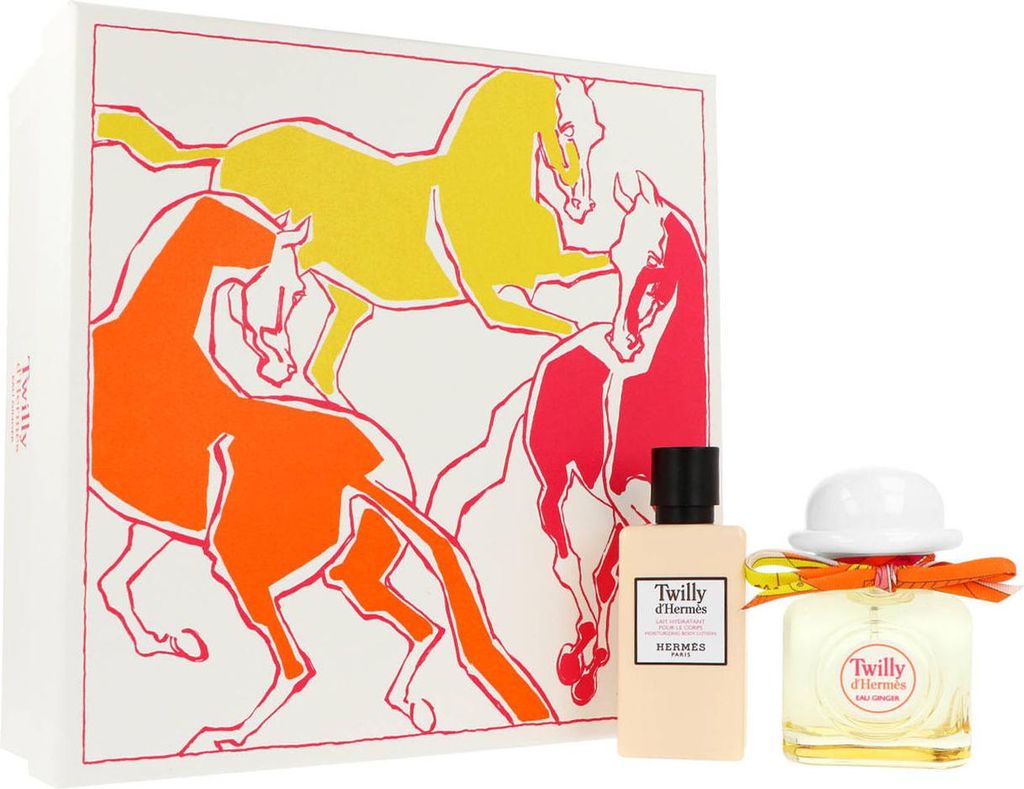 A gift set of Hermès Twilly d'Hermès Eau Ginger EDP and body lotion, presented in a box with a horse graphic.