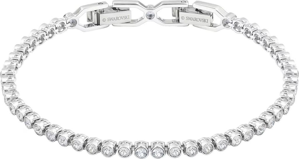 A close-up studio shot of a silver Swarovski tennis bracelet with clear crystals.
