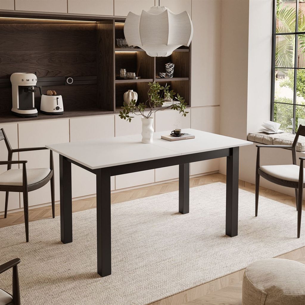A dining table set in a modern kitchen or dining area.