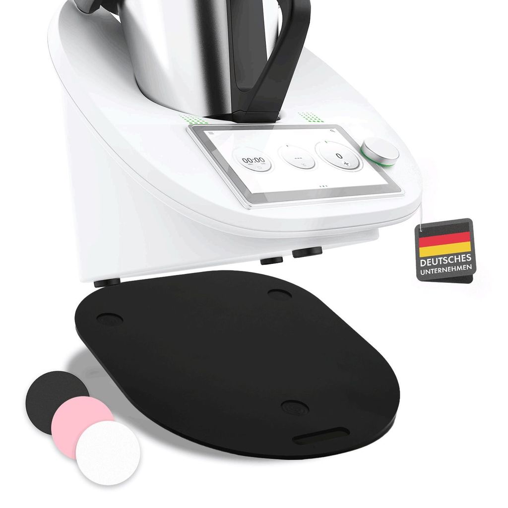 A close-up of a kitchen appliance with a mat underneath and smaller mats in the foreground.