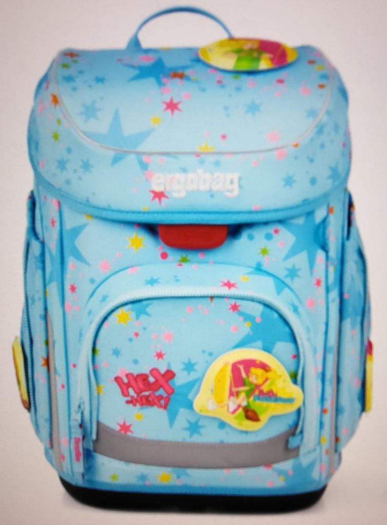 A light blue children's backpack with a star pattern and cartoon characters.
