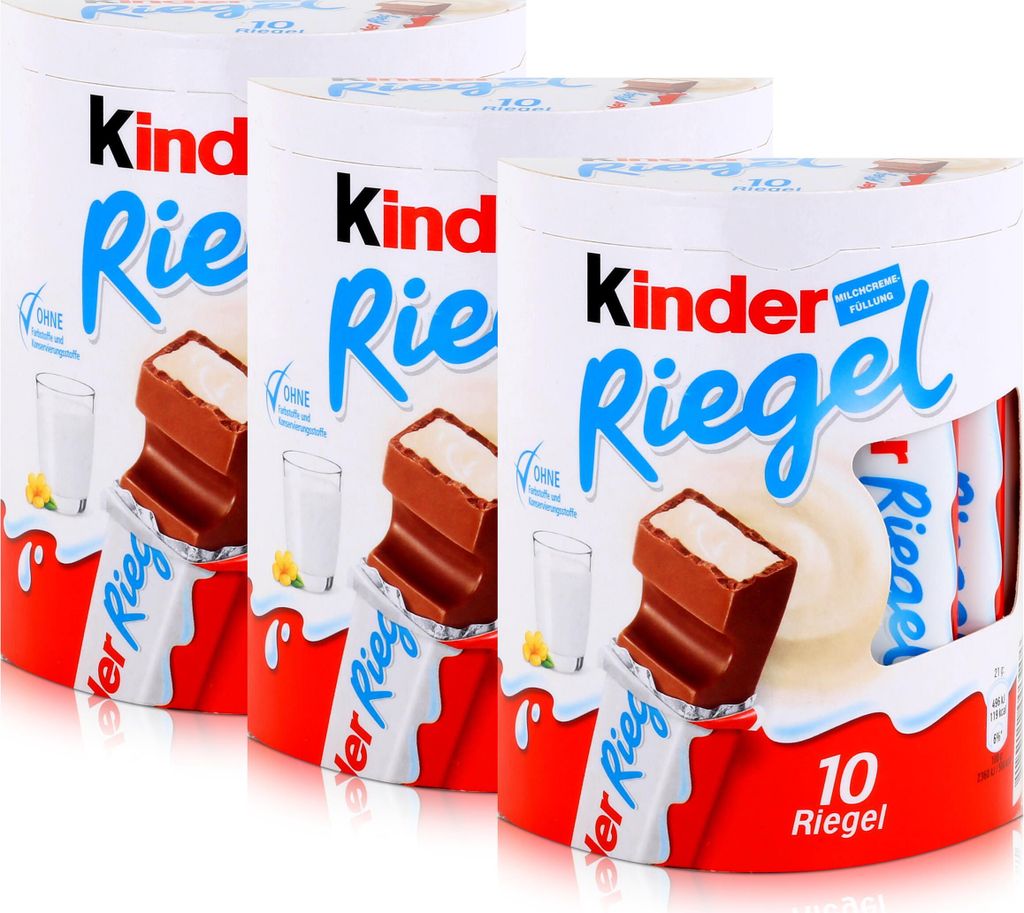 Three cylindrical packages of Kinder Riegel chocolate bars are arranged in a row, with the front package slightly forward.