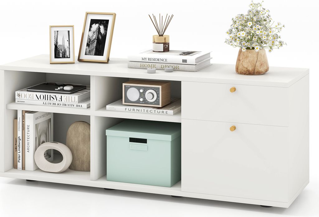 A white storage cabinet with multiple shelves and drawers, decorated with various items.
