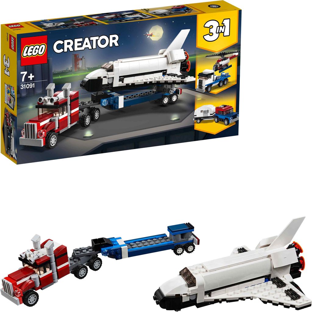 A LEGO Creator set box showing a space shuttle transporter, with smaller images of alternative builds.