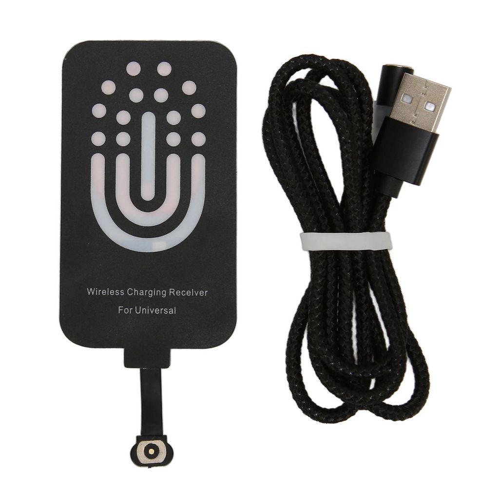 A wireless charging receiver and a USB cable are laid out on a white background.