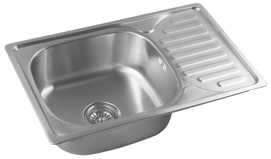 A stainless steel kitchen sink with a draining board.