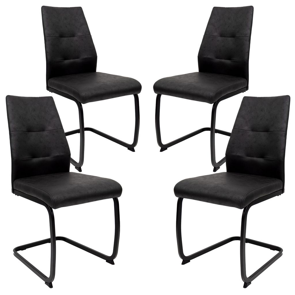 Four black dining chairs on a white background.