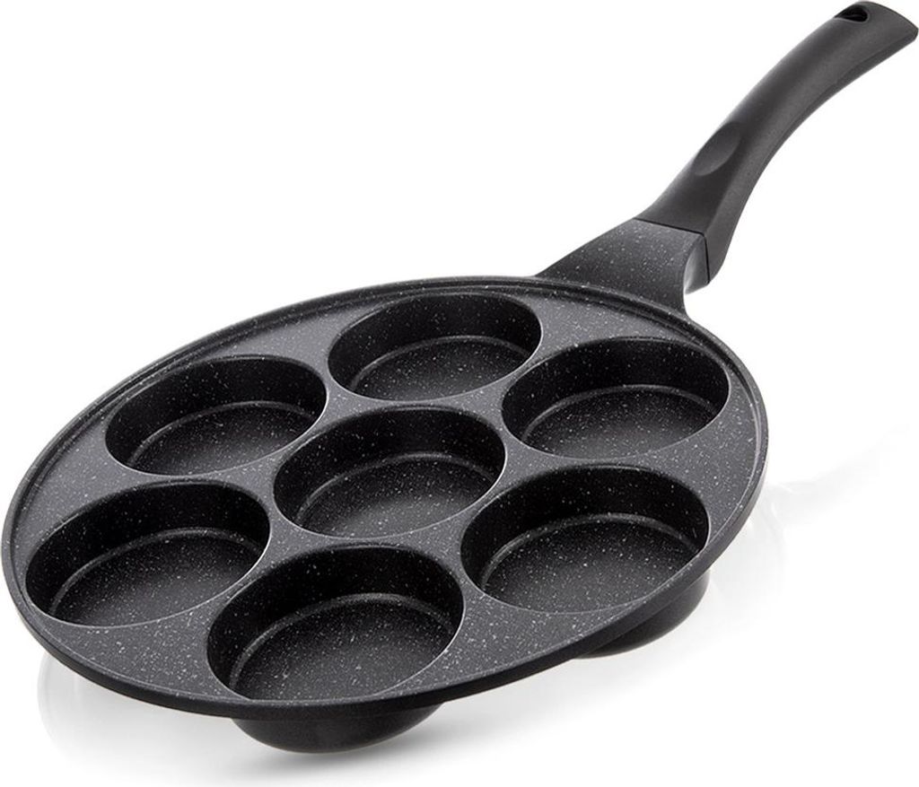 A black frying pan with seven circular indentations for cooking small items like pancakes or eggs.