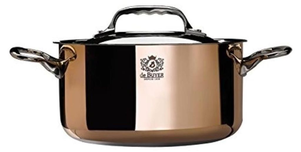 A copper pot with silver handles and lid.