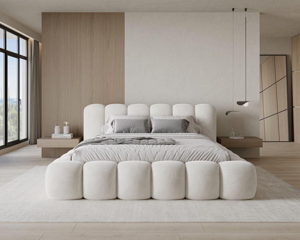 A modern bedroom with a large bed.