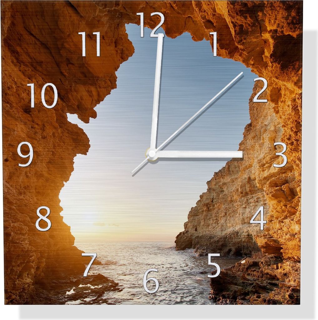 Wallario Design Wanduhr Höhlen am Meer aus Aluverbund, Größe 30 x 30 cm
