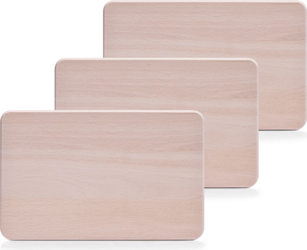 Three wooden cutting boards are stacked diagonally on a white background.