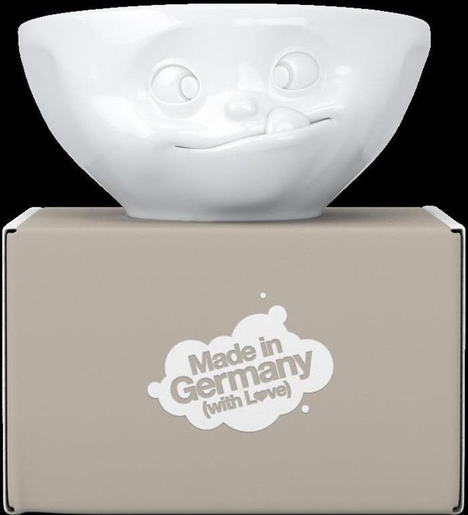 A white ceramic bowl with a face design sits on top of its packaging box.
