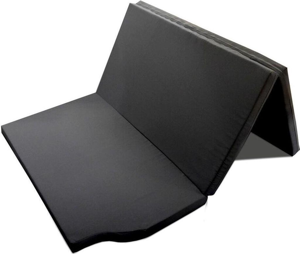 A folded black mattress is shown against a white background.
