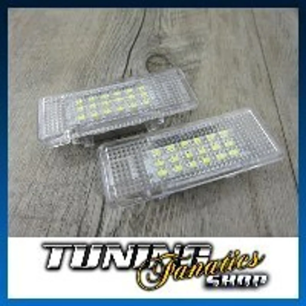 Illuminazione LED BMW Porte e Piedi: Set 2 Pezzi 18 SMD 6000K Bianco