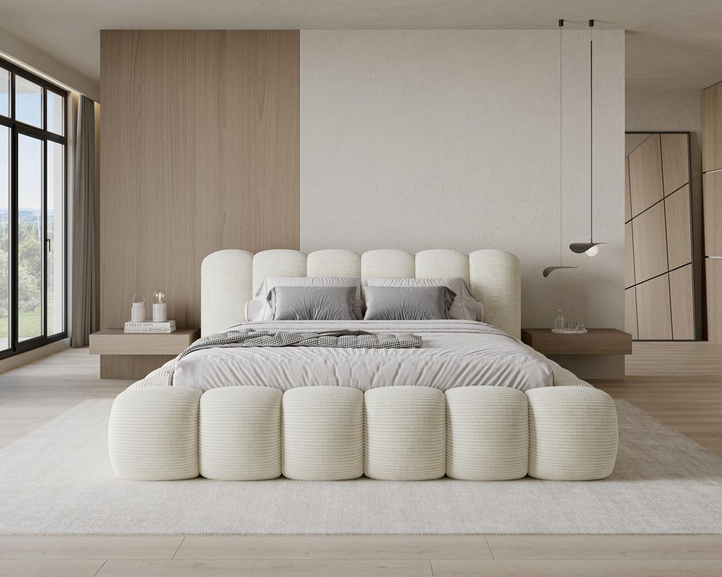 A modern bedroom with a large bed.