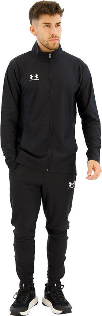 A man wearing a black tracksuit.