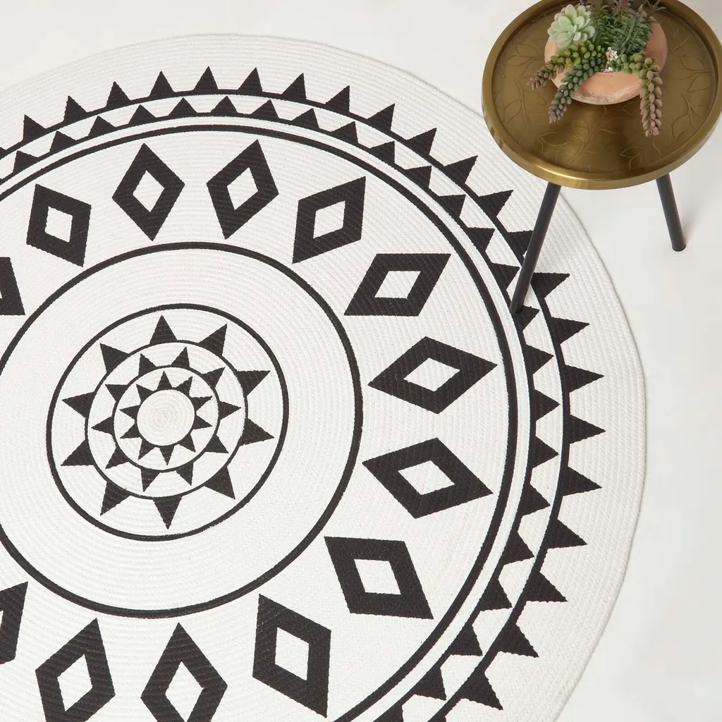Rénovez vos sols avec le tapis rond Lia 200 cm coton tressé noir et blanc